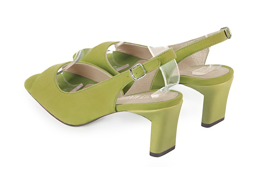 Women's pistachio green open-toe dress pumps with back strap. Square toe. Medium comma heels - Rear view
